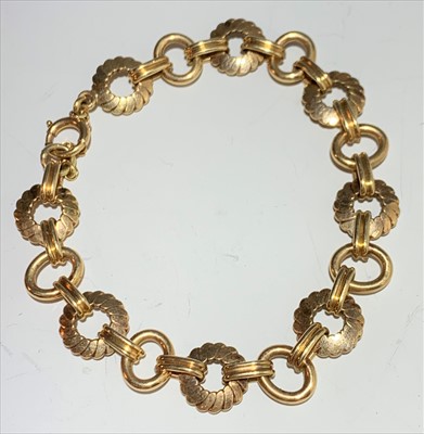 Lot 2605 - A 9ct gold bracelet, 19.6g.