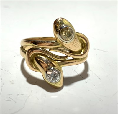 Lot 2587 - A 9ct gold twin headed snake ring, one head...