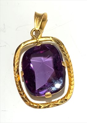Lot 2567 - A 22ct gold amethyst set pendant.