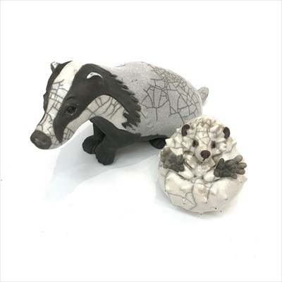 Lot 1473 - A Brian Andrew raku pottery badger and hedghog,...
