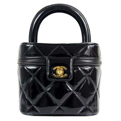 Lot 516 - A Chanel Matelasse patent black leather CC vanity bag.
