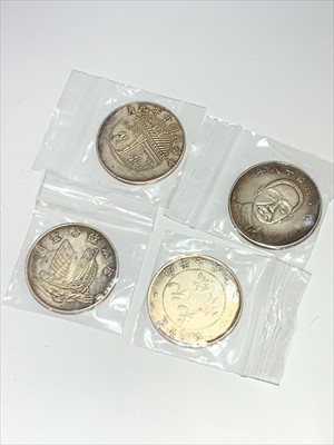 Lot 2564 - Four Chinese silver coins, 3.27oz.