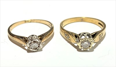 Lot 2582 - Two gold solitaire diamond rings