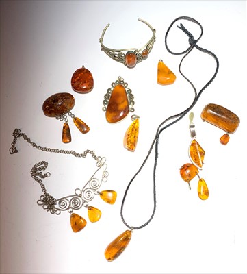 Lot 2559 - An amber and silver necklace, six amber...