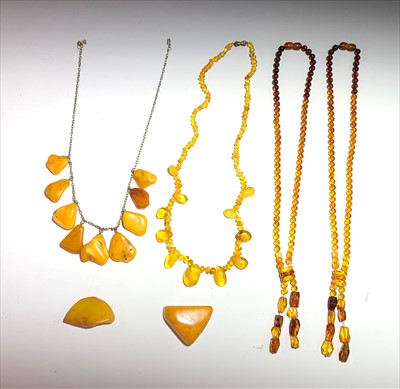Lot 2531 - Four amber necklaces and two small pieces of...