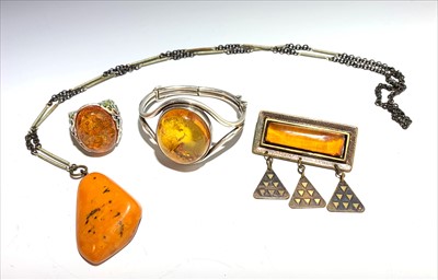 Lot 2625 - An amber set silver bracelet, an amber and...
