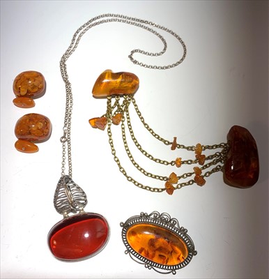 Lot 2623 - A pair of amber cufflinks, a silver and amber...