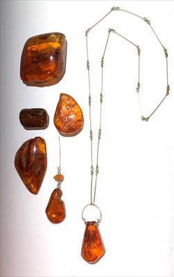 Lot 2617 - An amber necklace, an amber brooch and four...