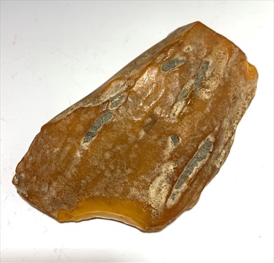 Lot 2603 - A large piece of amber, 11.2 x 6.5 x 1.5cm,...