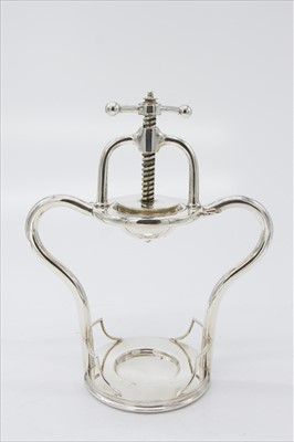 Lot 2314 - A Mappin Brothers silver plated lemon squeezer,...