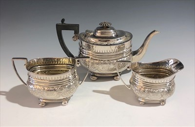 Lot 2087 - A Cooper Brothers three piece silver...