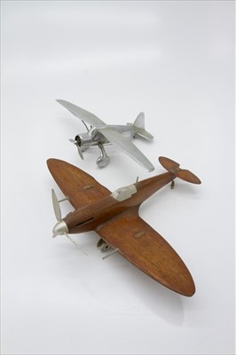 Lot 394 - A chrome aeroplane and together with a treen...