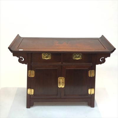 Lot 3302 - A Chinese hardwood cabinet, with two freize...