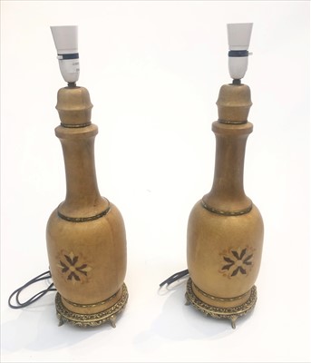 Lot 431 - A pair of turned wood and gilt metal table...
