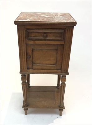 Lot 3309 - A French walnut marble top pot cupboard.