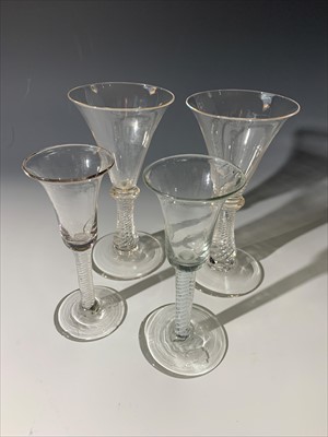 Lot 1481 - A pair of spiral stem glasses and two 18th...