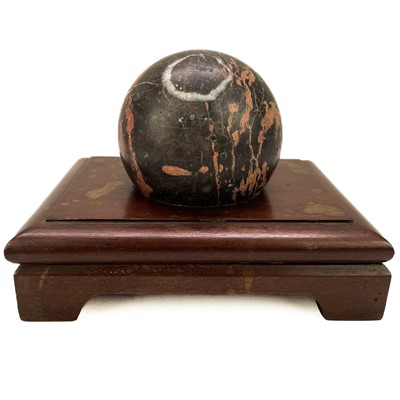 Lot 22 - A Torquay Devon turned marble sphere.